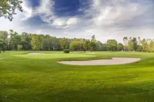 Golf courses in Phuket: Scenic golf course with sand bunkers and green.