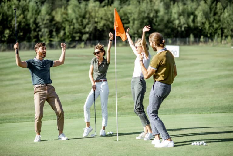 Golf Activities in Laguna Phuket – Resorts, Courses & Events 1 Golf activities in Laguna Phuket: Group of golfers celebrating a successful putt